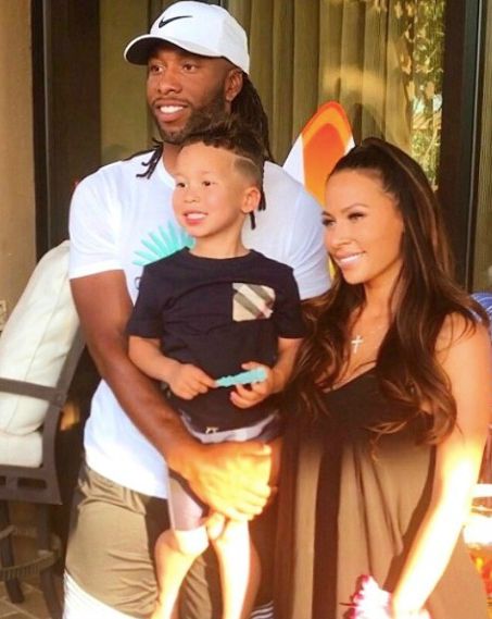 larry fitzgerald with her wife and child