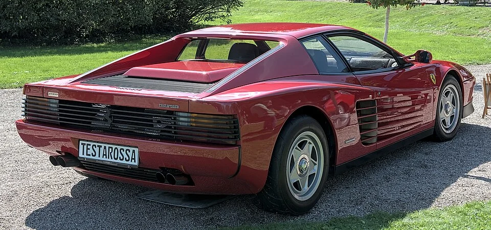 Red 1991 Ferrari Testarossa rear view - Jordan Belfort's real car verified by warranty documents